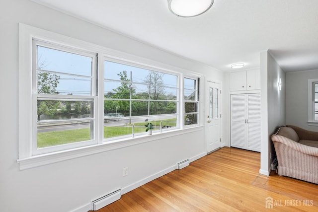 192 Lakeview Ave, Piscataway, NJ 08854 - foyer featuring a baseboard radiator and light wood finished floors