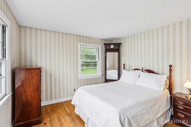 192 Lakeview Ave, Piscataway, NJ 08854 - bedroom featuring wood finished floors and wallpapered walls