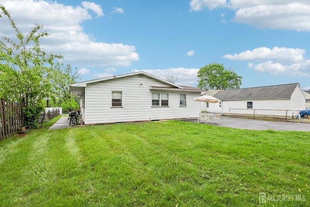 192 Lakeview Ave, Piscataway, NJ 08854 - rear view of house featuring a fenced backyard and a patio