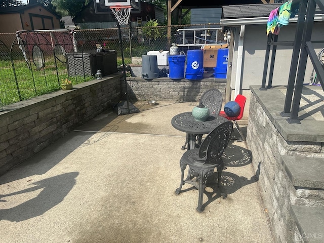 view of patio with fence