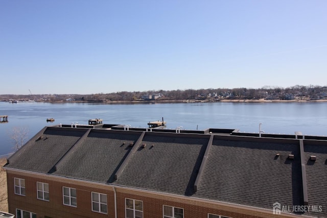 view of dock with a water view