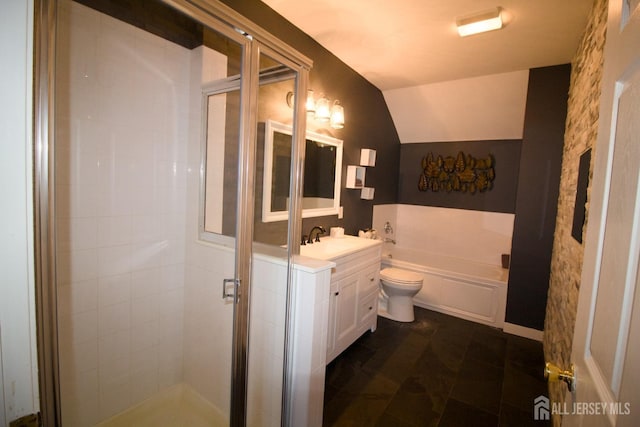 bathroom with a garden tub, toilet, a stall shower, vanity, and vaulted ceiling