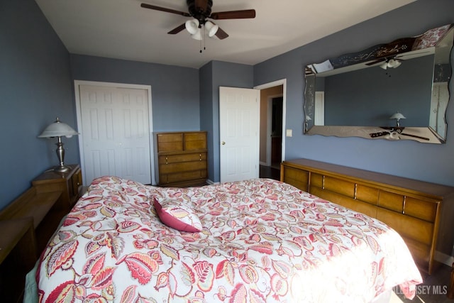 bedroom with a ceiling fan, carpet, and a closet