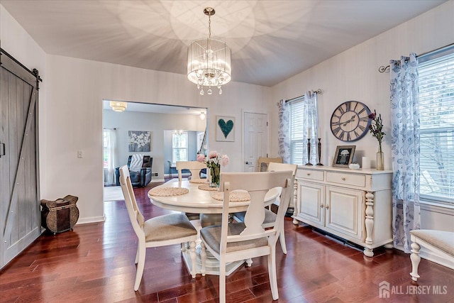 9 Sedgwick St, Jamesburg, NJ 08831 - dining area with a chandelier, a barn door, and dark wood-style flooring