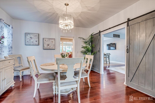 9 Sedgwick St, Jamesburg, NJ 08831 - dining space with a barn door, dark wood-style floors, and a chandelier