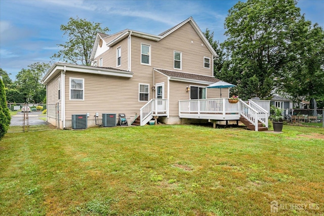9 Sedgwick St, Jamesburg, NJ 08831 - rear view of house featuring a wooden deck and a gate