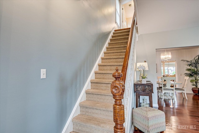 9 Sedgwick St, Jamesburg, NJ 08831 - stairway with a chandelier and wood finished floors