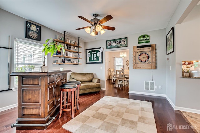 9 Sedgwick St, Jamesburg, NJ 08831 - bar featuring ceiling fan and dark wood-style flooring