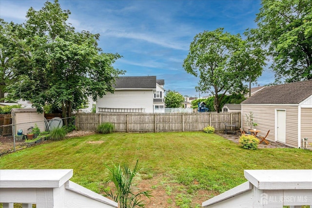 9 Sedgwick St, Jamesburg, NJ 08831 - fenced backyard featuring a shed