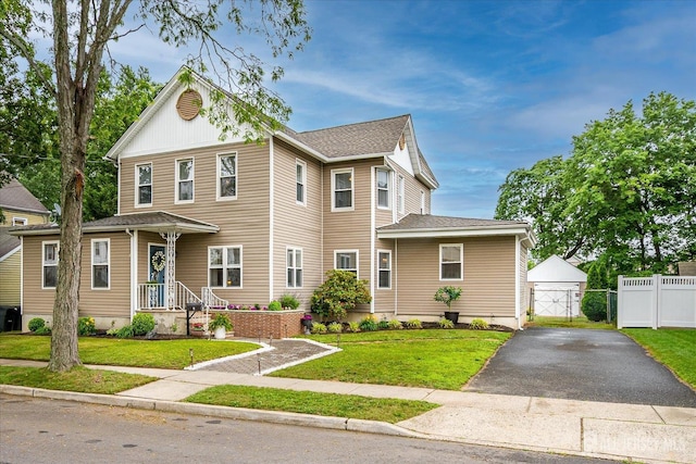 9 Sedgwick St, Jamesburg, NJ 08831 - view of front of home featuring a gate and a detached garage