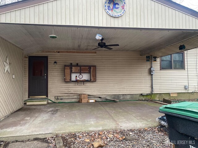 view of patio featuring ceiling fan