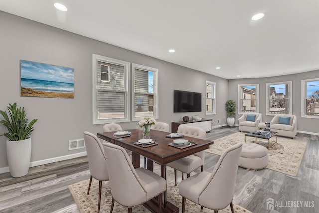 dining room with light hardwood / wood-style flooring