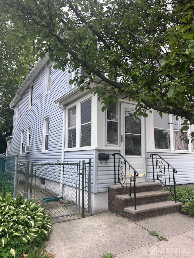 349 David St, South Amboy, NJ 08879 - view of front of property featuring cooling unit and a gate