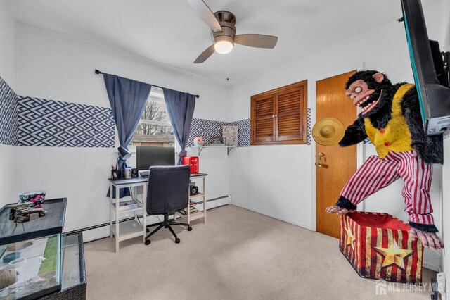 home office with carpet floors and ceiling fan