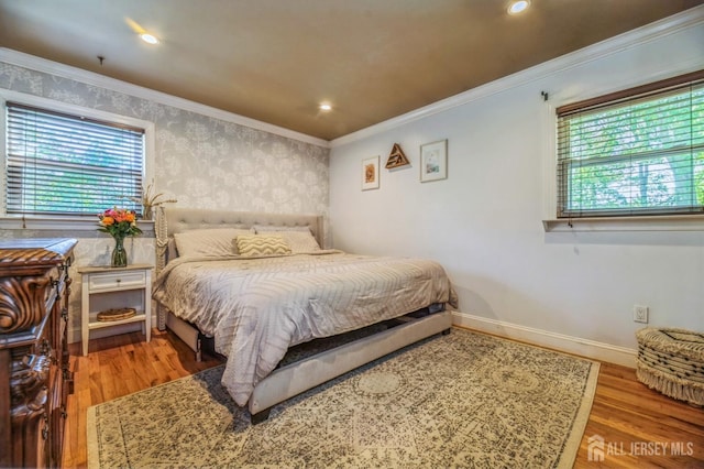 350 Church Ln, North Brunswick, NJ 08902 - bedroom featuring multiple windows, wood finished floors, crown molding, baseboards, and recessed lighting