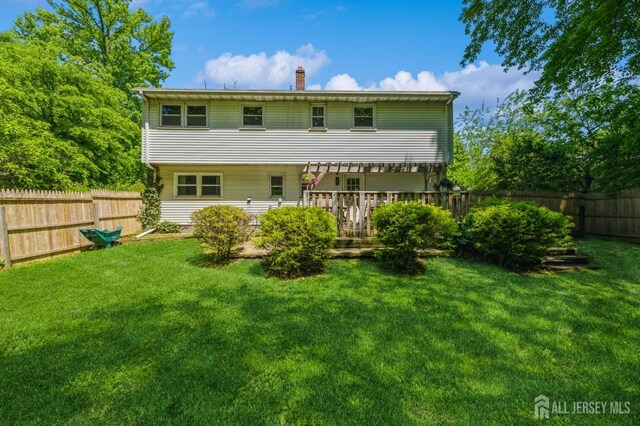 350 Church Ln, North Brunswick, NJ 08902 - rear view of property with a chimney