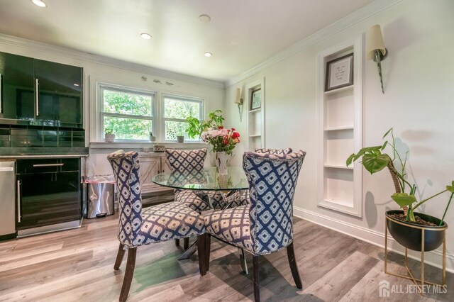 350 Church Ln, North Brunswick, NJ 08902 - dining area featuring built in features, wood finished floors, crown molding, baseboards, and recessed lighting