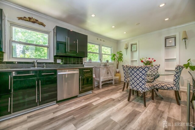 350 Church Ln, North Brunswick, NJ 08902 - kitchen with stainless steel dishwasher, a sink, green cabinets, light wood-style floors, and ornamental molding