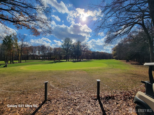 view of home's community with view of golf course
