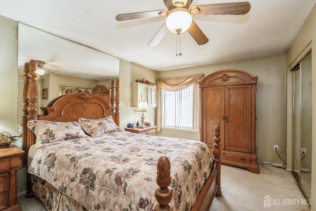bedroom with light colored carpet and ceiling fan
