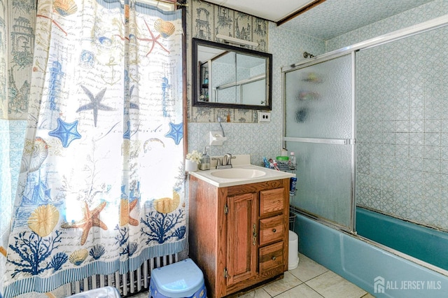 195 Ward St, New Brunswick, NJ 08901 - full bathroom featuring vanity, wallpapered walls, bath / shower combo with glass door, tile patterned flooring, and toilet
