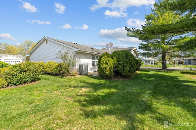 620 Deal Rd Unit 620A, Monroe, NJ 08831 - view of property exterior featuring a lawn and central AC unit