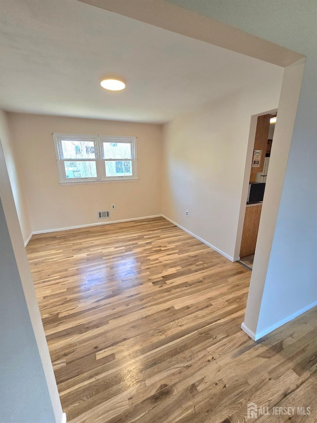 20 Ellingham Ave, Monroe, NJ 08831 - unfurnished room with wood finished floors and baseboards