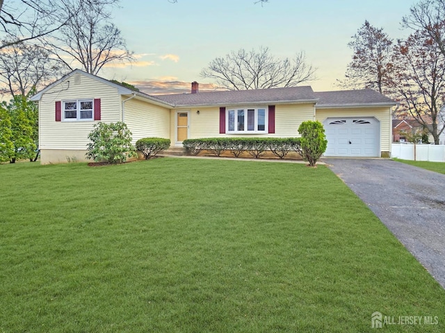 20 Ellingham Ave, Monroe, NJ 08831 - ranch-style home featuring asphalt driveway, an attached garage, and a chimney