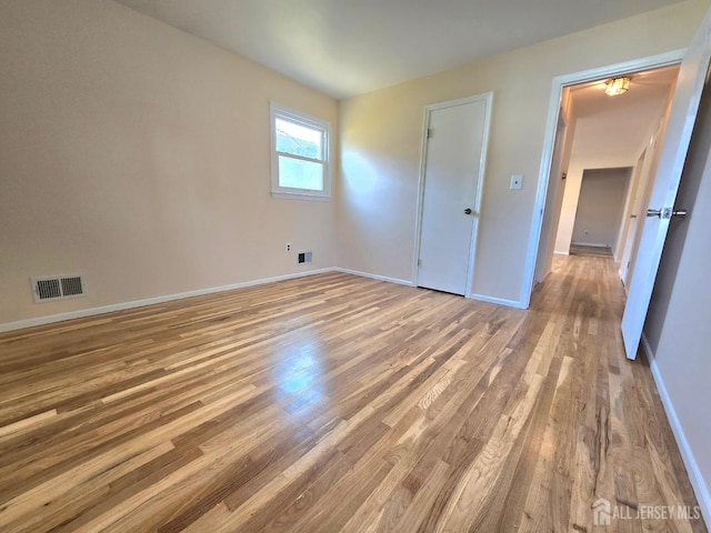 20 Ellingham Ave, Monroe, NJ 08831 - unfurnished bedroom featuring wood finished floors and baseboards