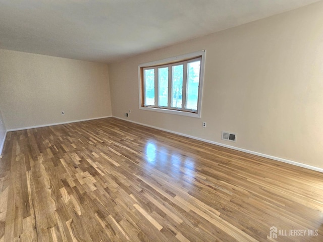 20 Ellingham Ave, Monroe, NJ 08831 - empty room with baseboards and wood finished floors