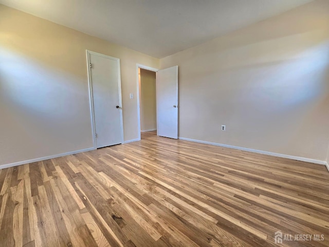 20 Ellingham Ave, Monroe, NJ 08831 - unfurnished room with baseboards and wood finished floors