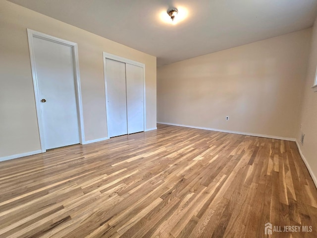 20 Ellingham Ave, Monroe, NJ 08831 - unfurnished bedroom featuring wood finished floors and baseboards