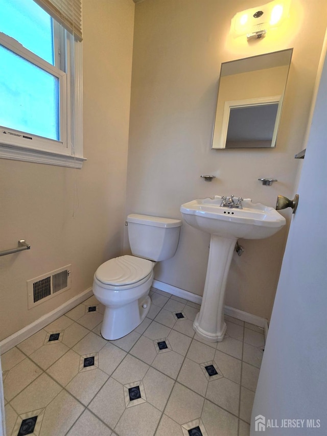 20 Ellingham Ave, Monroe, NJ 08831 - bathroom featuring baseboards, toilet, tile patterned floors, and a sink
