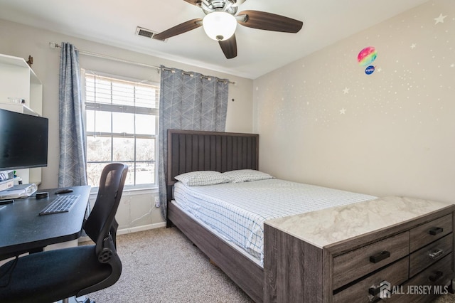 bedroom featuring light carpet, baseboards, visible vents, and ceiling fan