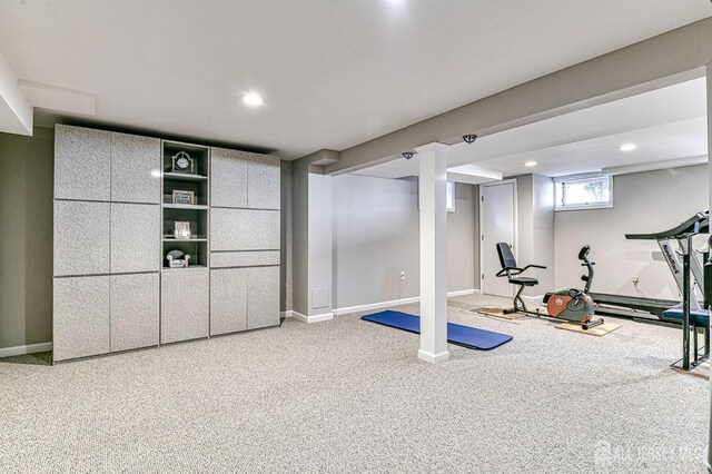 exercise room with carpet flooring