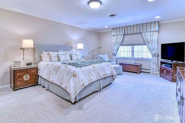 bedroom with a baseboard heating unit, carpet floors, and ornamental molding