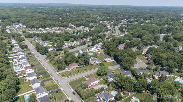 1 Wilfred Rd, Manalapan, NJ 07726 - aerial view of property and surrounding area featuring a forest