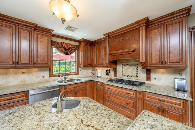 1 Wilfred Rd, Manalapan, NJ 07726 - kitchen featuring stainless steel appliances, light stone countertops, tasteful backsplash, brown cabinetry, and premium range hood