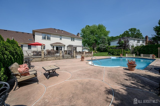 1 Wilfred Rd, Manalapan, NJ 07726 - outdoor pool with a patio area