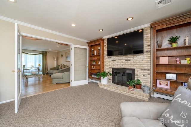 1 Wilfred Rd, Manalapan, NJ 07726 - carpeted living room featuring baseboard heating, crown molding, a brick fireplace, recessed lighting, and french doors