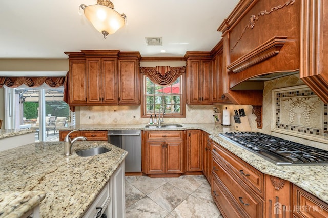 1 Wilfred Rd, Manalapan, NJ 07726 - kitchen featuring stainless steel appliances, brown cabinets, light stone countertops, and backsplash