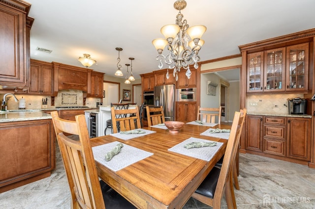 1 Wilfred Rd, Manalapan, NJ 07726 - dining area with a chandelier