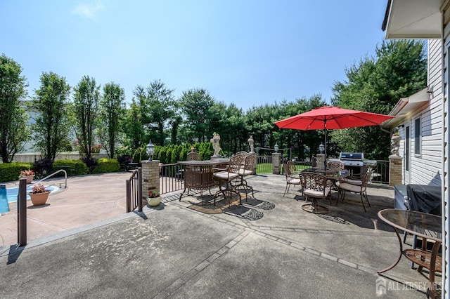 1 Wilfred Rd, Manalapan, NJ 07726 - view of patio / terrace with outdoor dining space and area for grilling