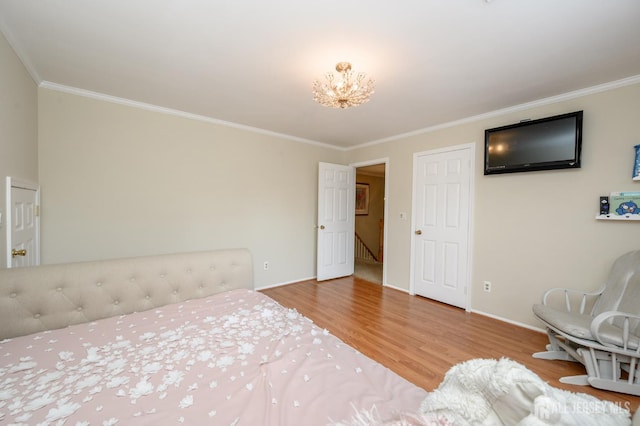 1 Wilfred Rd, Manalapan, NJ 07726 - bedroom with wood finished floors, ornamental molding, and a chandelier