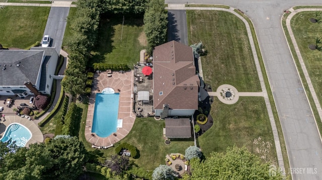 1 Wilfred Rd, Manalapan, NJ 07726 - aerial view of property and surrounding area featuring a pool area