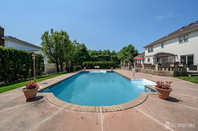 1 Wilfred Rd, Manalapan, NJ 07726 - view of swimming pool featuring a patio and area for grilling