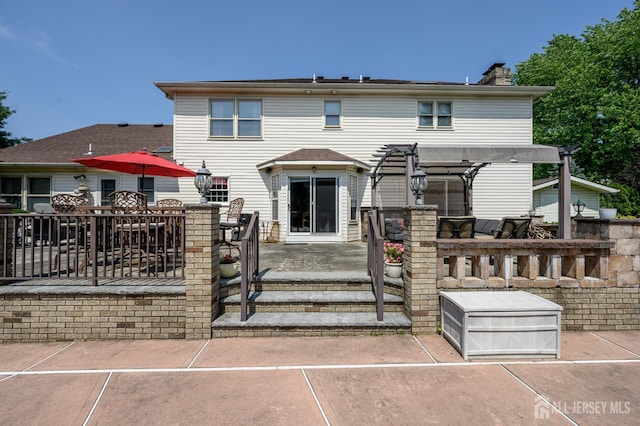 1 Wilfred Rd, Manalapan, NJ 07726 - rear view of property with a patio area, a pergola, and a chimney