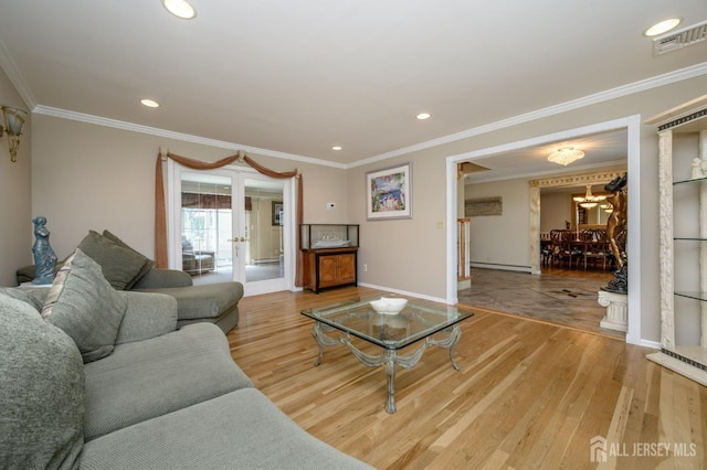 1 Wilfred Rd, Manalapan, NJ 07726 - living room with french doors, light wood-style flooring, recessed lighting, ornamental molding, and a chandelier