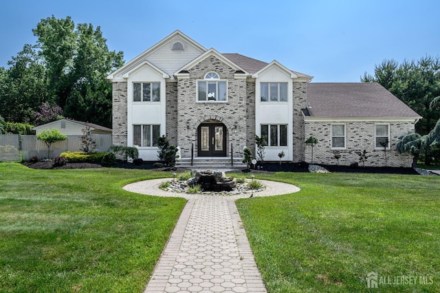 1 Wilfred Rd, Manalapan, NJ 07726 - view of front of home with french doors and brick siding