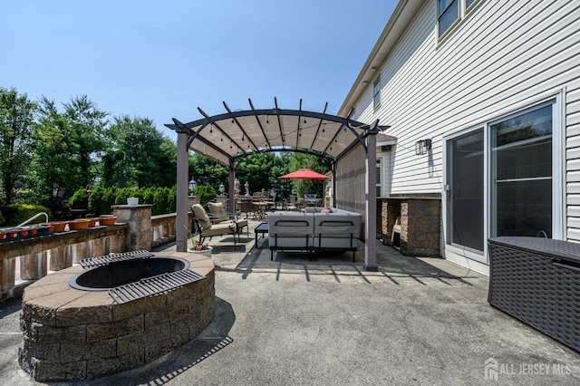 1 Wilfred Rd, Manalapan, NJ 07726 - view of patio / terrace with a pergola, an outdoor living space with a fire pit, and outdoor dining area